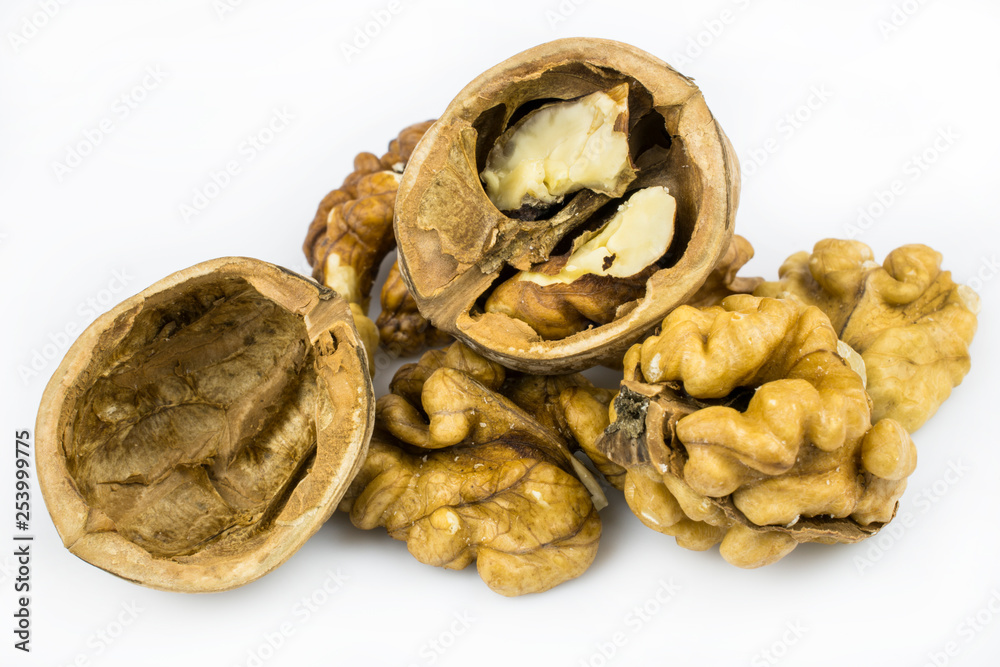 Chopped walnuts, shells, isolated on a white background. Chopped walnuts, shells, isolated on a white background.