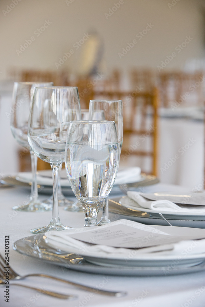 Fototapeta premium wedding table set for fine dining at a fancy catered event - wedding table series