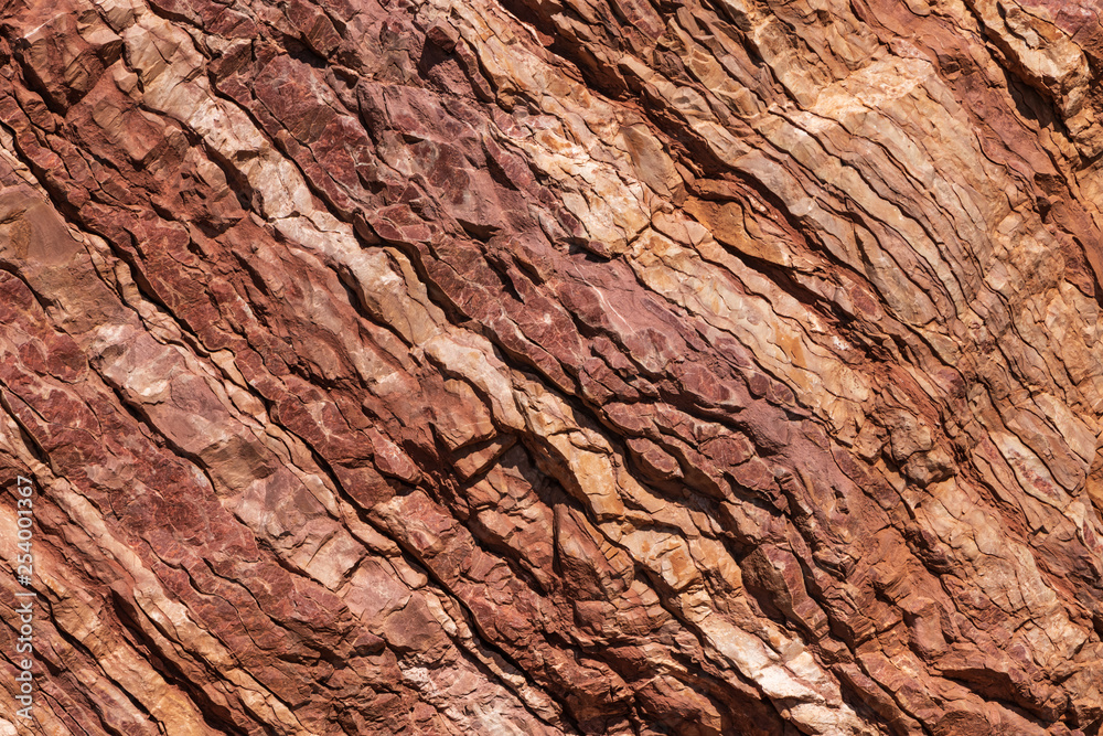 Natural texture of red stone rock. - obrazy, fototapety, plakaty 