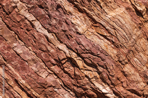 Natural texture of red stone rock.