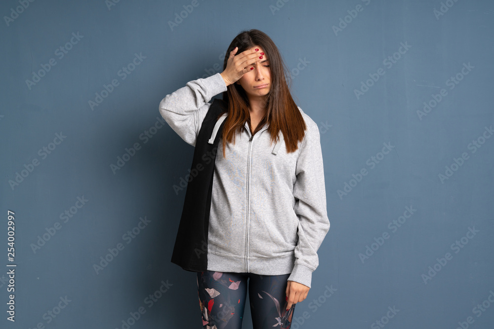 Young sport woman with tired and sick expression Young sport woman with tired and sick expression