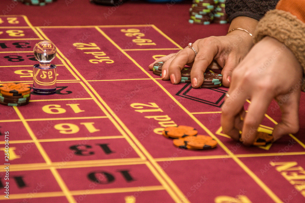 roulette accessories on red gaming table roulette accessories on red gaming table