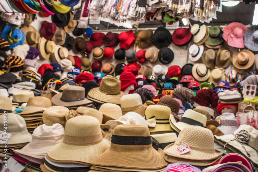 Straw Hats Displayed at Flea Market Bazaar