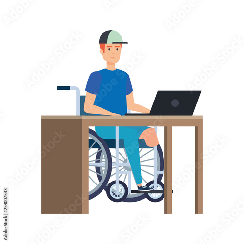 young man in wheelchair working in the office