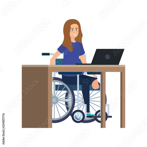 young woman in wheelchair working in the office