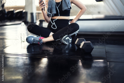 Young Woman a exercise in gym fitness relax, Athlete builder muscles lifestyle © kavee29
