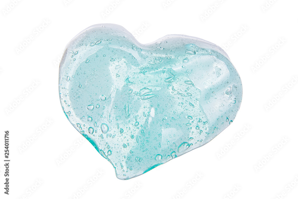 Green slime for kids in a heart shape, transparent funny toy. Isolated on Withe Background Green slime for kids in a heart shape, transparent funny toy. Isolated on Withe Background
