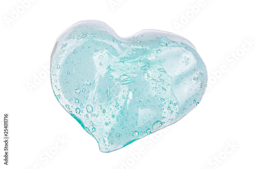 фотографія Green slime for kids in a heart shape, transparent funny toy