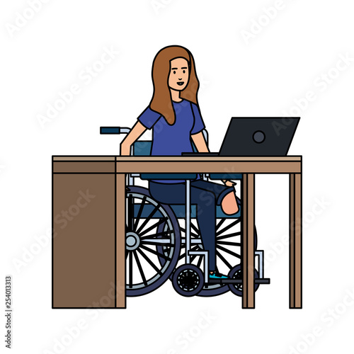 young woman in wheelchair working in the office