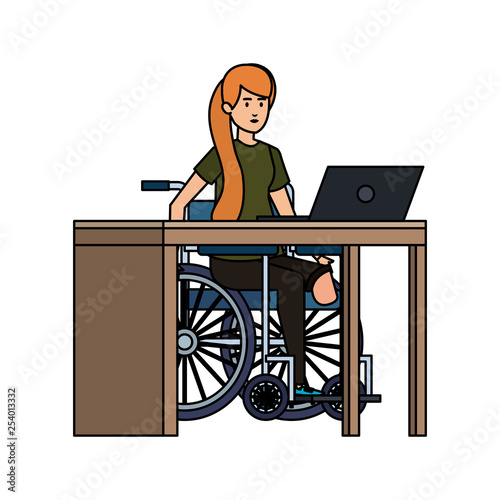 young woman in wheelchair working in the office