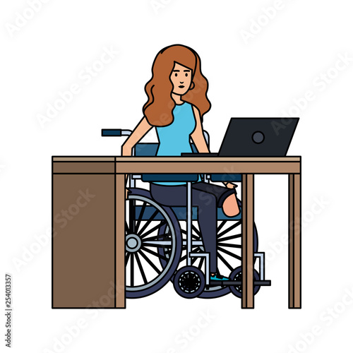 young woman in wheelchair working in the office