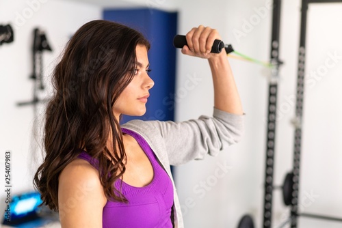 Young sport woman in a gym