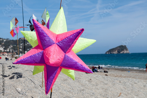 flying kites in ligurian riviera, spotorno