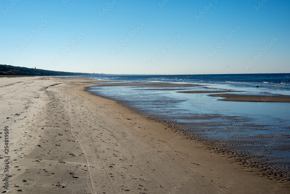 empty sandy beach by the sea