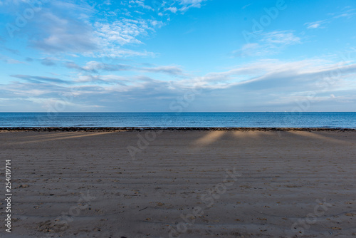 Fototapeta Naklejka Na Ścianę i Meble -  empty sandy beach by the sea
