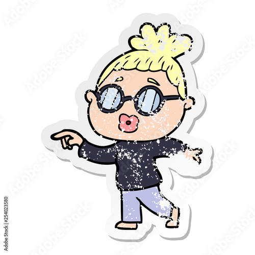 distressed sticker of a cartoon woman wearing spectacles