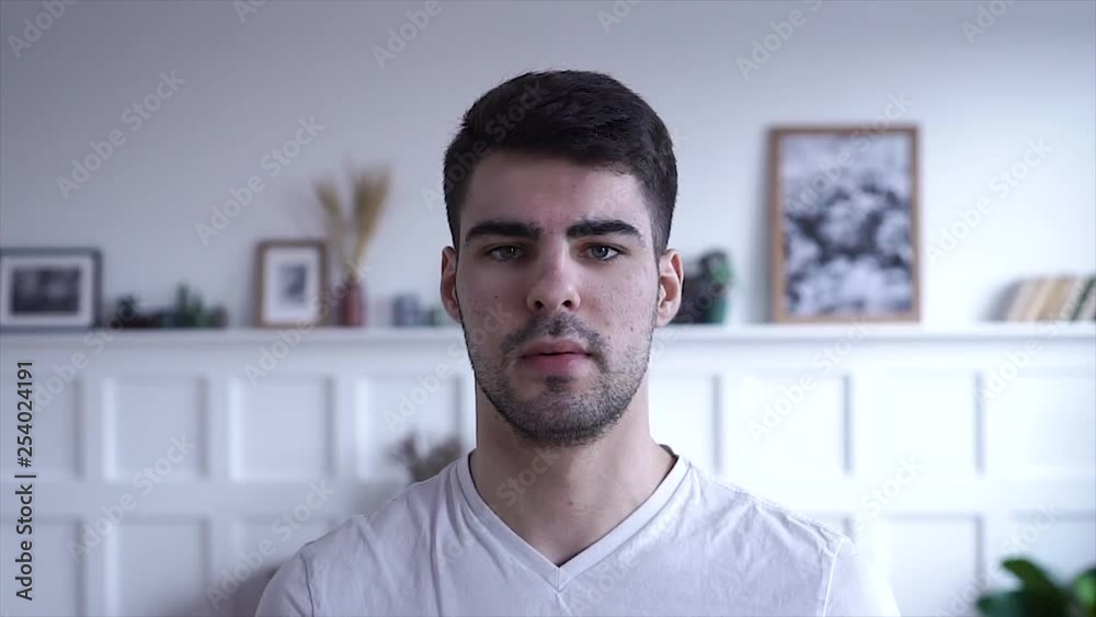 close up portrait of young attractive middle eastern businessman looking at camera in office workspace background real people series close up portrait of young attractive middle eastern businessman looking at camera in office workspace background real people series
