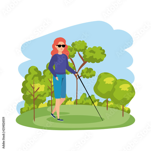 blind woman with walking stick