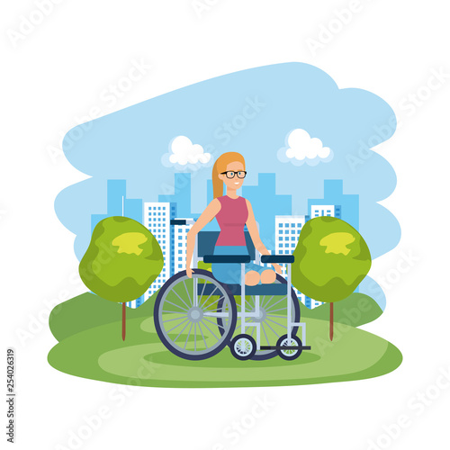 young woman in wheelchair in the park