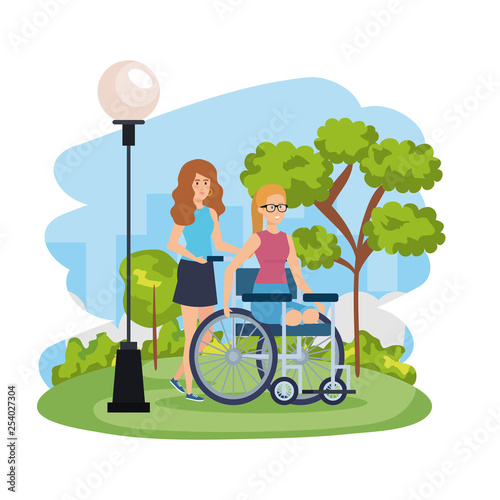 young woman in wheelchair with female helper