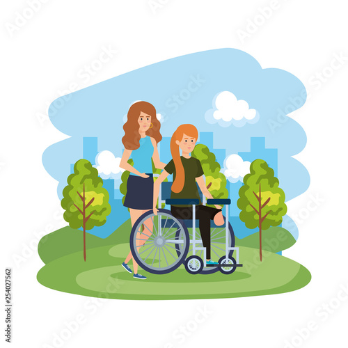 young woman in wheelchair with female helper