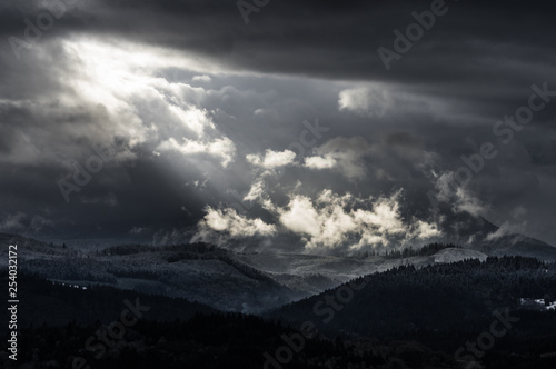 Hidden From View - Clouds part in front of Marys Peak revealing snow on the Oregon Coast Range foothills.