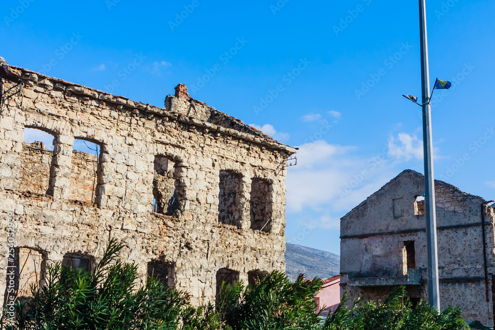 Abandoned building, detroyed during Bosnian War at Bulevar Street in Mostar city, Bosnia and Herzegovina Abandoned building, detroyed during Bosnian War at Bulevar Street in Mostar city, Bosnia and Herzegovina