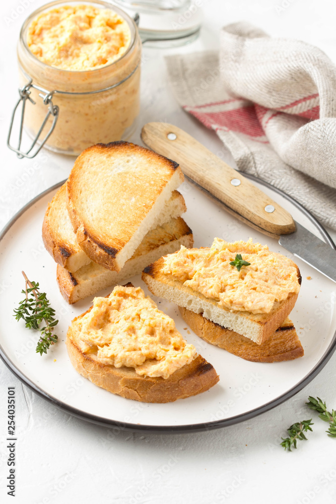 Chicken pate with carrots on toast bread, delicious spread for Breakfast. Healthy food, vegetable snack, wine aperitizer Chicken pate with carrots on toast bread, delicious spread for Breakfast. Healthy food, vegetable snack, wine aperitizer