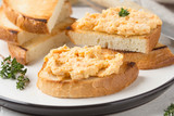 Chicken pate with carrots on toast bread, delicious spread for Breakfast. Healthy food, vegetable snack, wine aperitizer