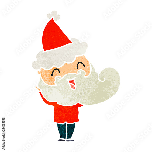 happy bearded man wearing santa hat
