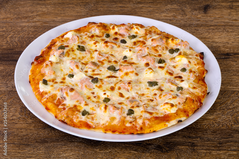 Pizza with salmon and capers Pizza with salmon and capers