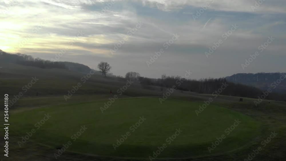 Aerial Flight Around Golf Green to Wide Fairway View. Aerial Flight Around Golf Green to Wide Fairway View.