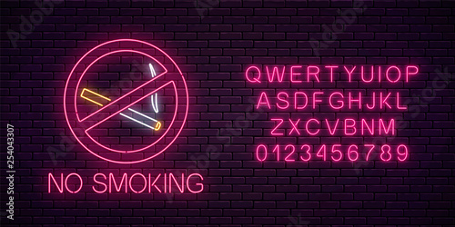 Glowing neon sign no smoking with alphabet. Ban on nicotine and smoke cigarettes. Signboard of no smoking place.