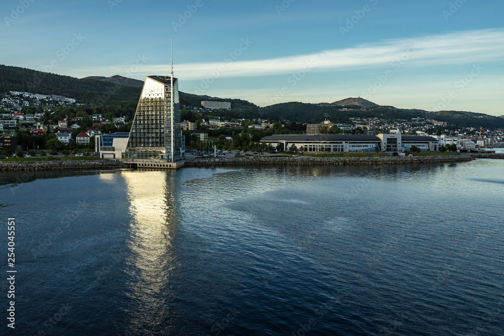 View of Molde at sunset with modern hotel and stadium, Norway