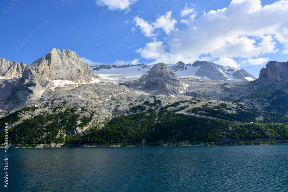 the spectacular Lake of Fedaia at the base of the Marmolada glacier
