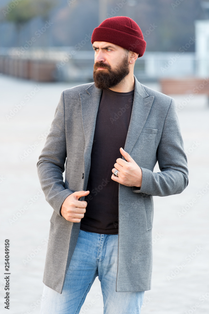 Man bearded hipster stylish fashionable coat and hat. Comfortable outfit.  Achieve desired fit. Hipster outfit and hat accessory. Stylish casual outfit  spring season. Menswear and male fashion concept Stock Photo