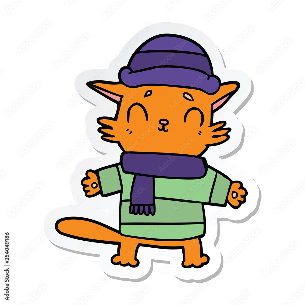 sticker of a cartoon cat in winter clothes