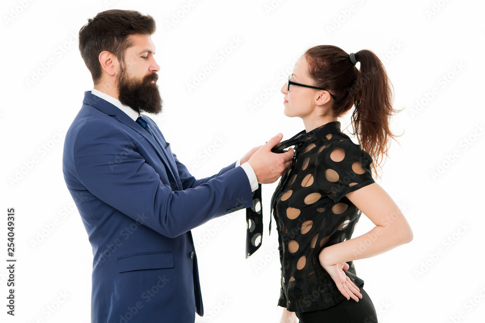 Boss and attractive lady assistant white background. Last detail. Business relations. Help each other look perfect. Business partners man and woman adjust outfit before business conference or meeting Boss and attractive lady assistant white background. Last detail. Business relations. Help each other look perfect. Business partners man and woman adjust outfit before business conference or meeting