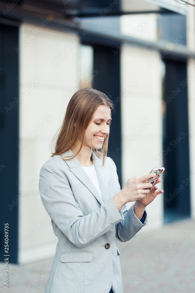 Young woman wearing casual using smartphone outdoor Young woman wearing casual using smartphone outdoor