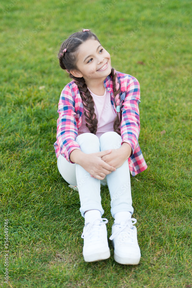 Day dreaming. Parks and outdoor. cheerful daydreamer. Spring nature. Summer picnic. Small school girl with trendy hair. happy childhood. small girl relax on green grass. Dreaming about vacation Day dreaming. Parks and outdoor. cheerful daydreamer. Spring nature. Summer picnic. Small school girl with trendy hair. happy childhood. small girl relax on green grass. Dreaming about vacation