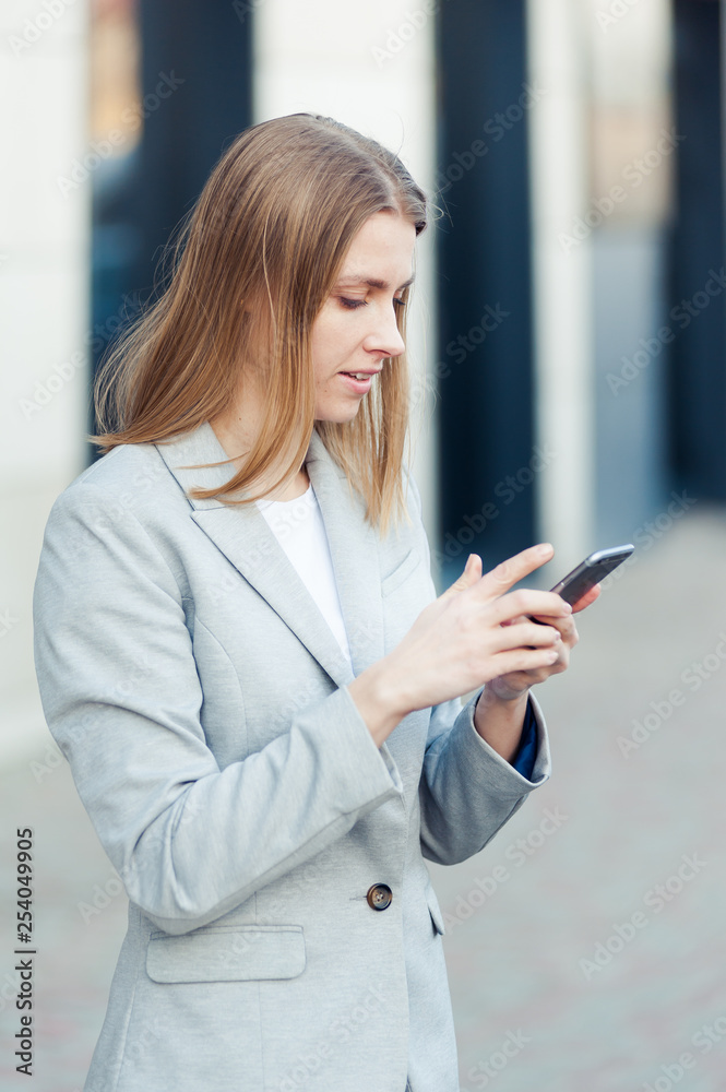 Young woman wearing casual using smartphone outdoor Young woman wearing casual using smartphone outdoor