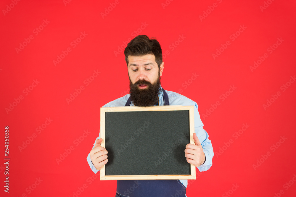Sorry we are closed. Hipster bartender show blackboard copy space. Hipster restaurant staff. Hipster informing you. Man bearded bartender or cook in apron hold blank chalkboard. Price list concept Sorry we are closed. Hipster bartender show blackboard copy space. Hipster restaurant staff. Hipster informing you. Man bearded bartender or cook in apron hold blank chalkboard. Price list concept