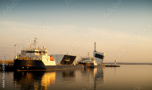 ship in harbor at sunset © gkamov