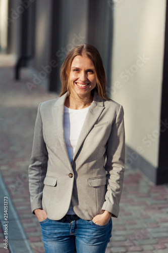 Portrait of beautiful smiling blonde young woman  © alipko