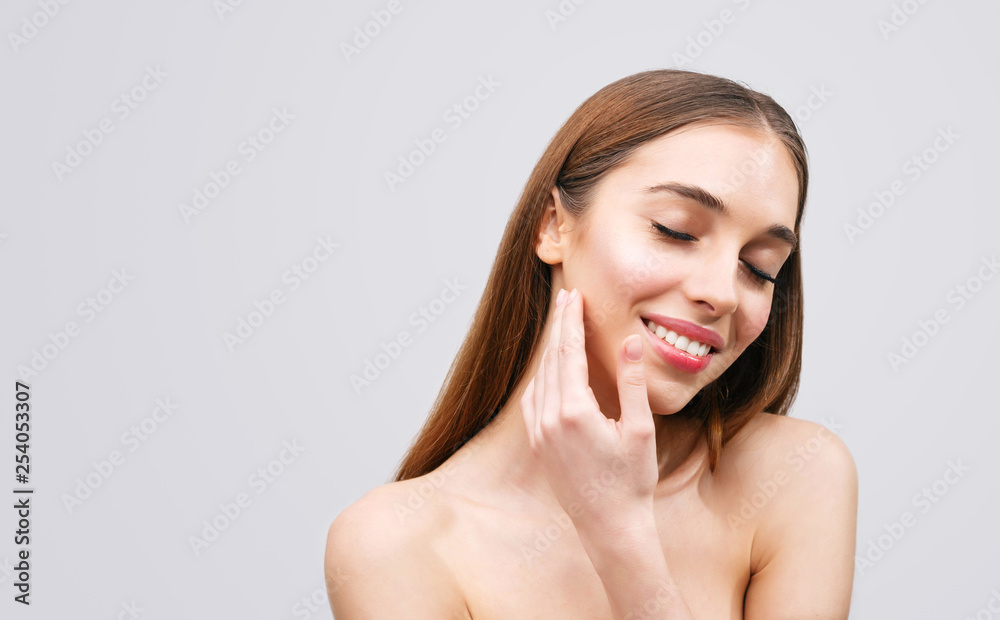 Close up beauty portrait of a smiling beautiful half naked woman Close up beauty portrait of a smiling beautiful half naked woman