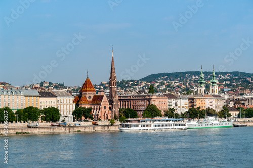 Szilagyi Dezso Square Reformed Church on the banks of the Danube River with St Anne's church in background - Budapest, Hungary