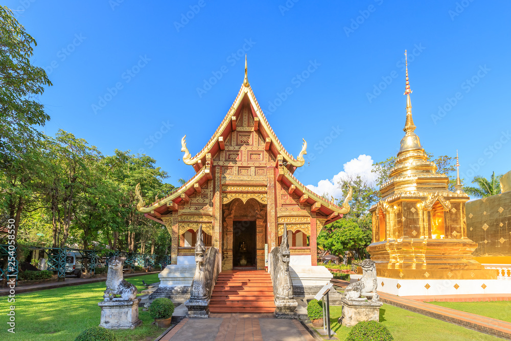 Chapel and golden pagoda at Wat Phra Singh Woramahawihan in Chiang Mai, North of Thailand