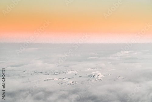 Aerial view of sunrise in winter nature landscape in north Iceland with glaciers in background. Snow Capped mountains and Glacier. © Mathias