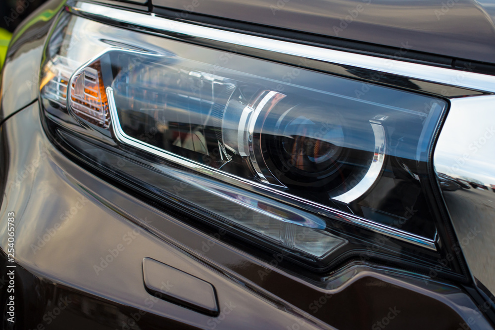 Closeup of car headlight - front view Closeup of car headlight - front view