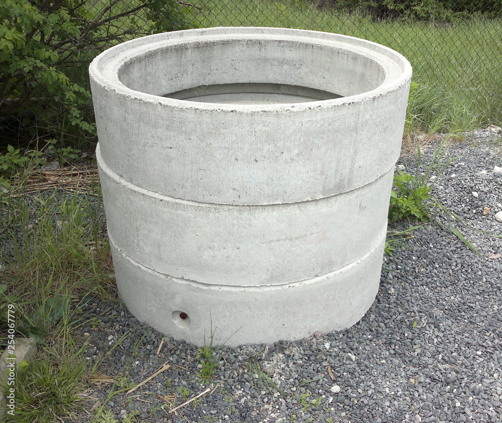 Concrete rings, three pieces laid on itself Concrete rings, three pieces laid on itself
